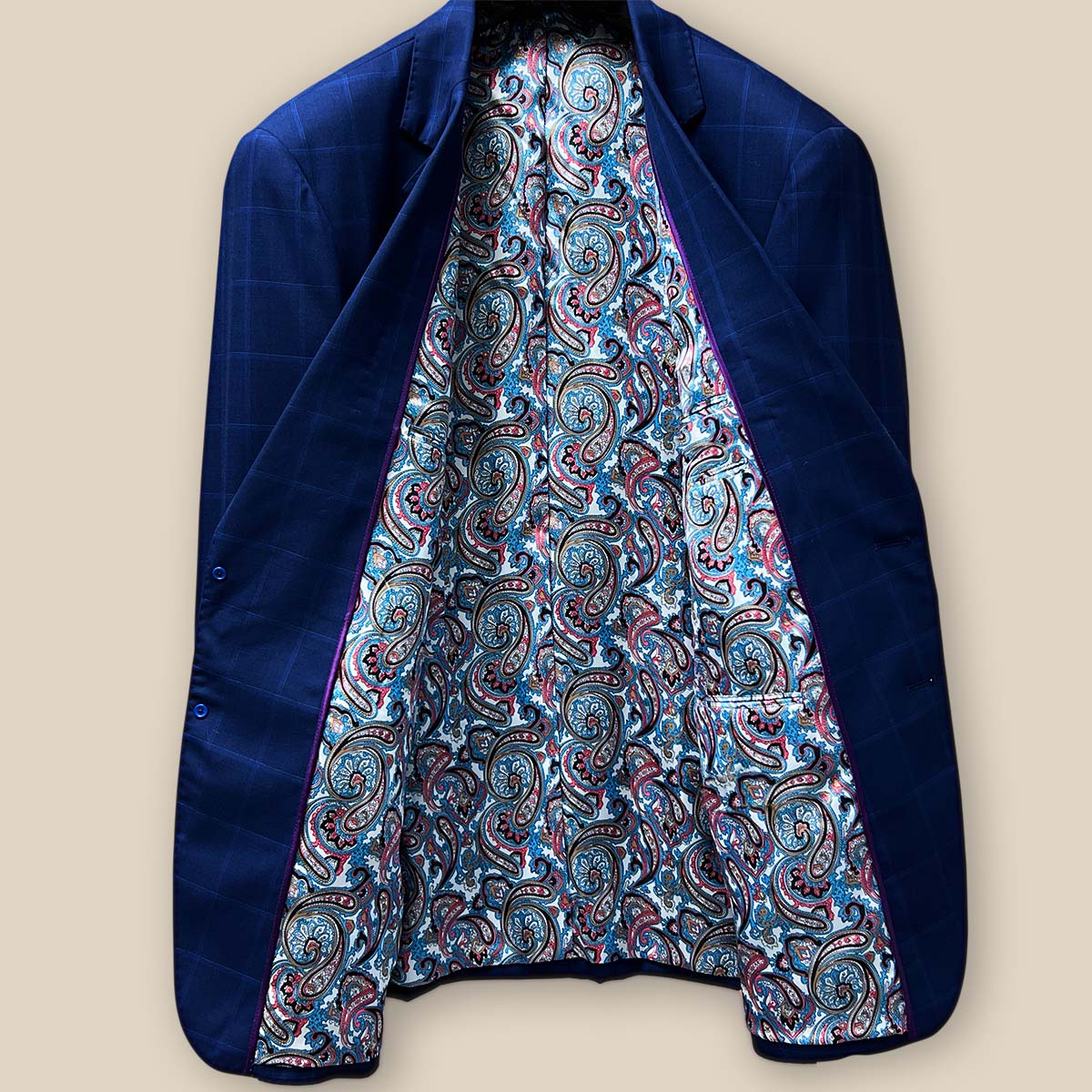 Full view of the jacket's interior lining displaying the vibrant multi-color fancy paisley pattern.