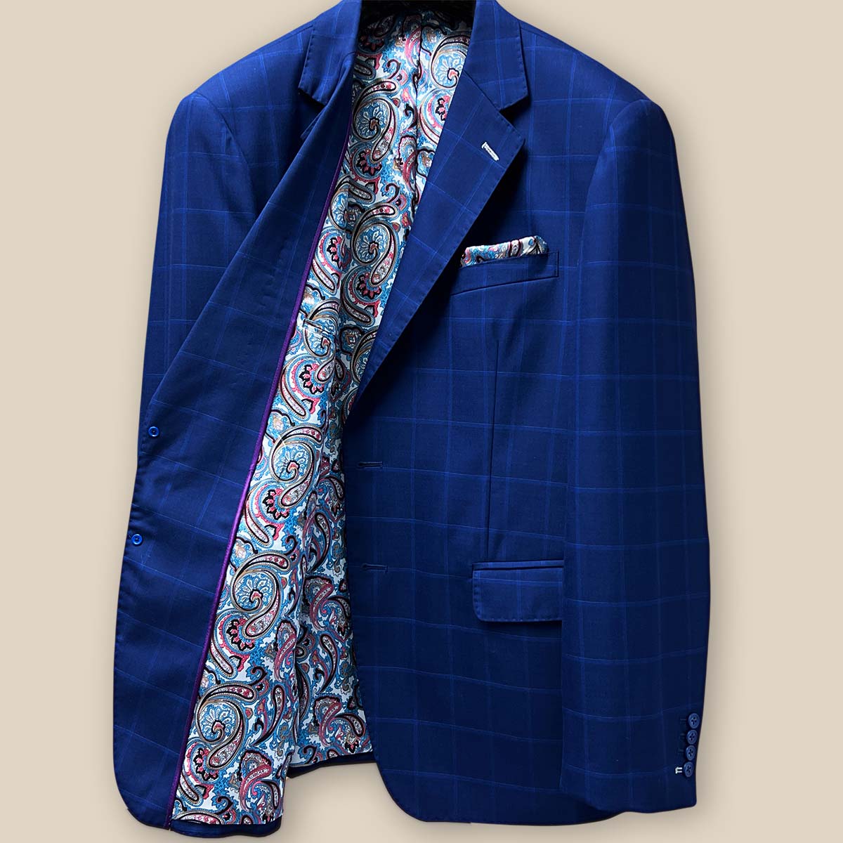 Interior view of the right side of the jacket showing the multi-color fancy paisley lining and detailed craftsmanship.