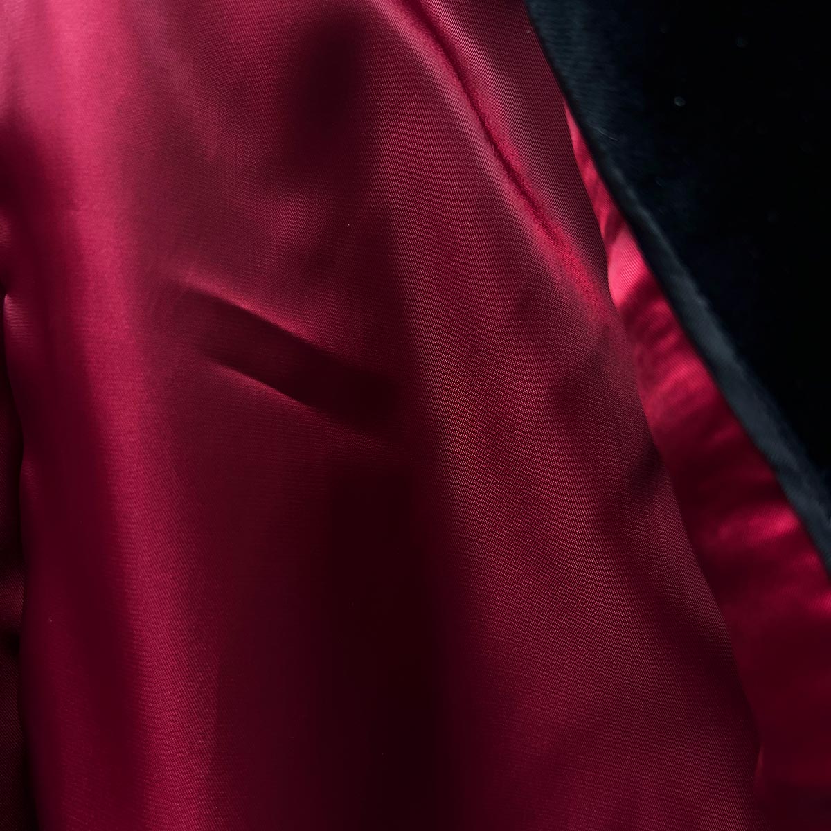 Luxurious Bemberg lining inside a black velvet tuxedo suit dinner jacket.