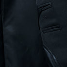 Bemberg lining providing a smooth and comfortable fit in a classic black men's suit.