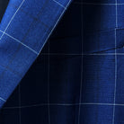 breast pocket view of a navy blue windowpane suit jacket