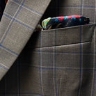 View of the built-in pocket square feature on a chocolate brown sportcoat.