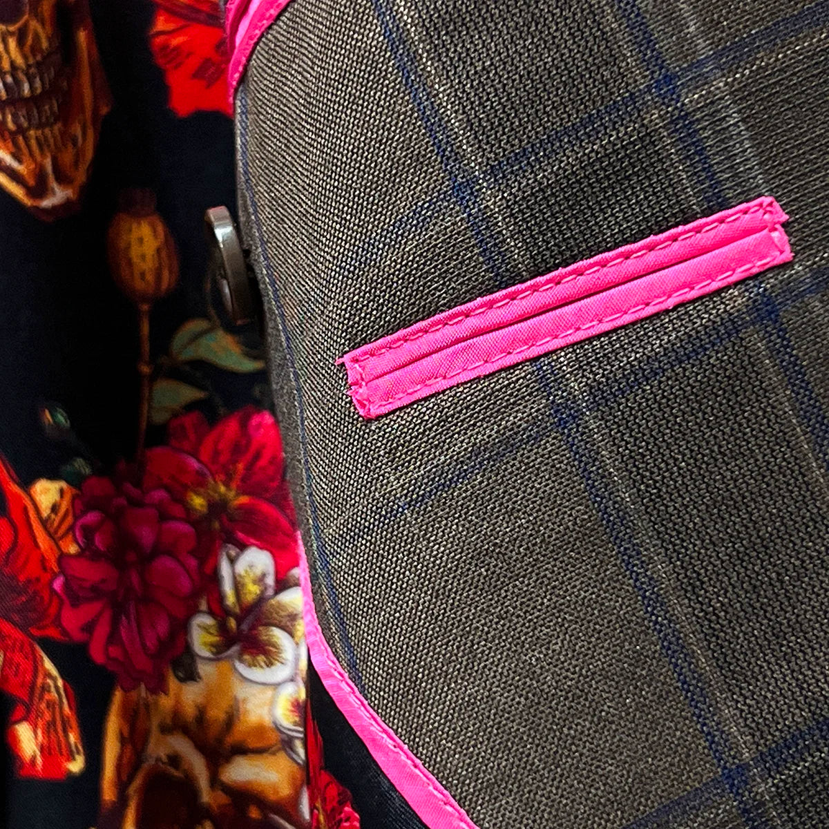 View highlighting the flash linings inside a chocolate brown sportcoat.