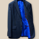 Interior view of the sportcoat showcasing the left side with royal blue lining and maroon trimming.
