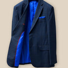 Inside view of the sportcoat's right side showing the royal blue lining and maroon inner pocket details.