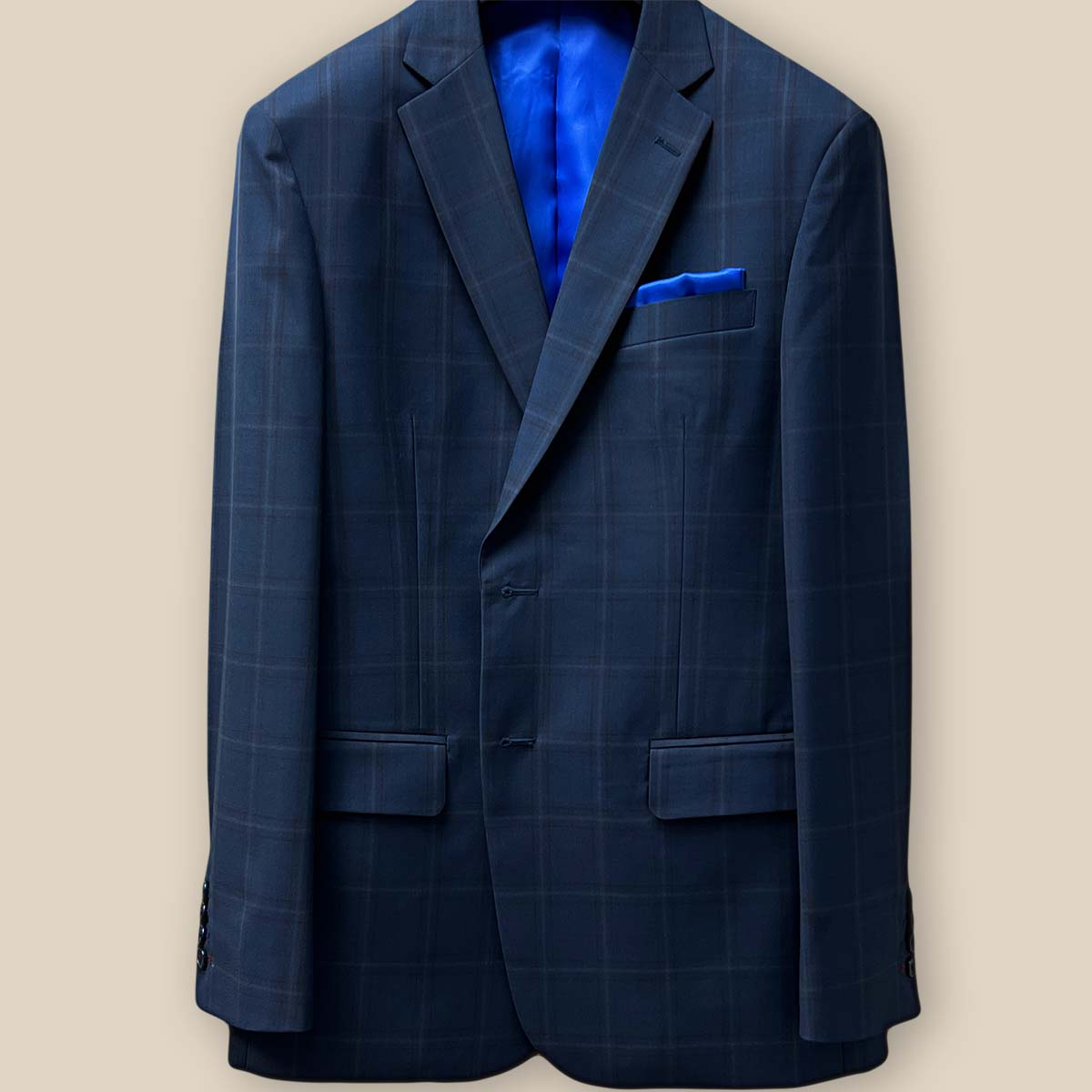 Close-up view of the dark midnight blue sportcoat's jacket buttonhole panel featuring maroon contrast stitching.