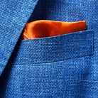 Built-in pocket square detail on the sportcoat, demonstrating the elegant craftsmanship and cohesive design.