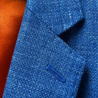 Close-up view of the notch lapel on the sportcoat, showcasing the sharp tailoring and classic design.