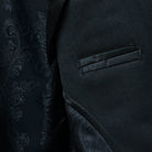 Interior flash linings of a black herringbone men's suit.