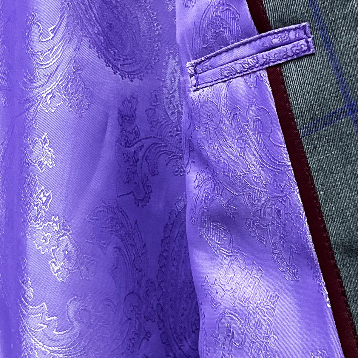 Flash linings inside the grey purple windowpane sportcoat.