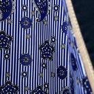 Full display of blue striped paisley flash lining showing pattern matching