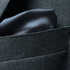 Detail of jacket breast pocket showcasing the birdseye pattern and pocket construction