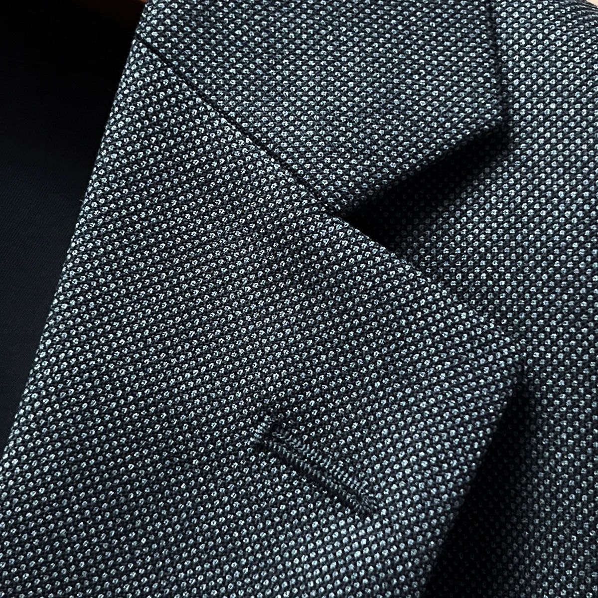 Close-up view of notch lapel showing the fine Super 150's wool texture and tailoring details