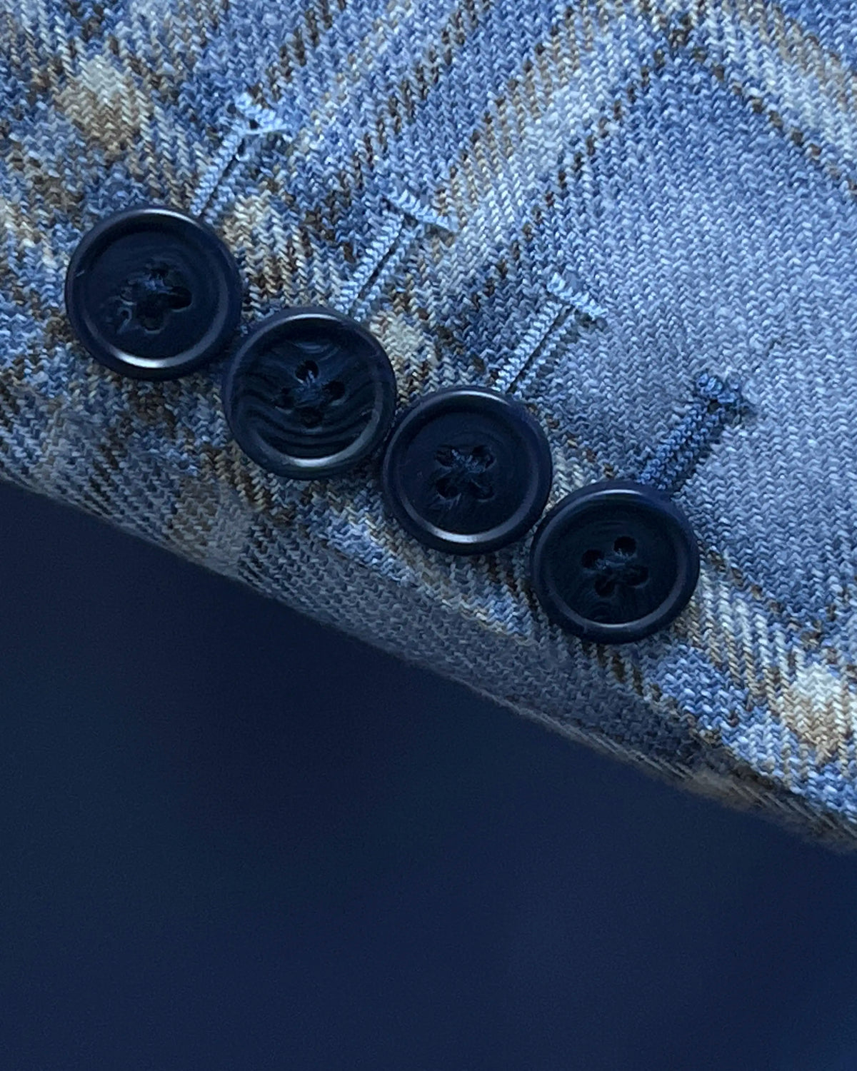 Sleeve cuff detail of Powder Blue with Tan Windowpane Plaid men's sport coat showing functional sleeve buttons and the contrast last buttonhole