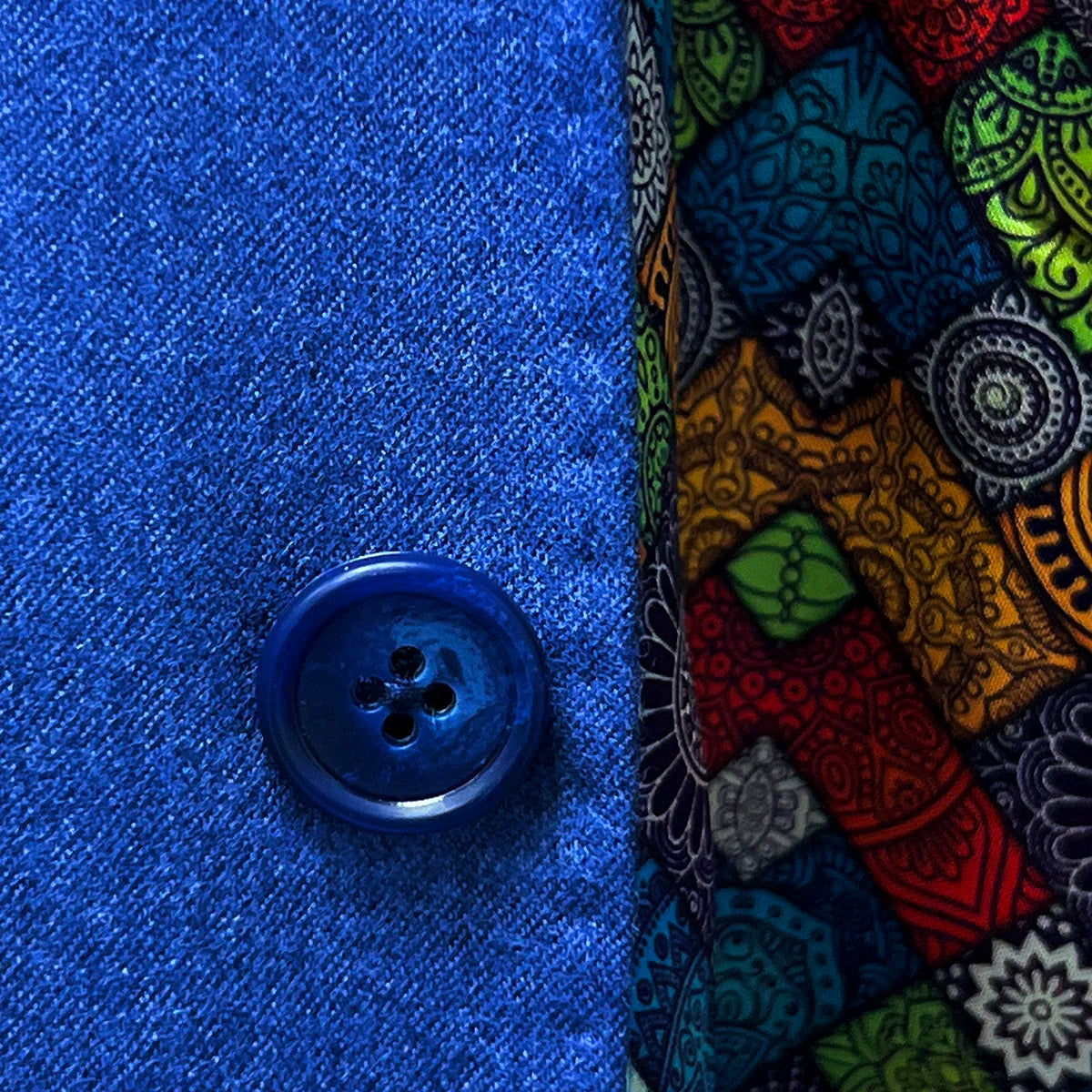 Horn marble buttons on a light blue flannel fall winter suit.