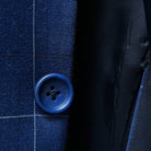 Blue horn marble buttons on a navy blue windowpane suit