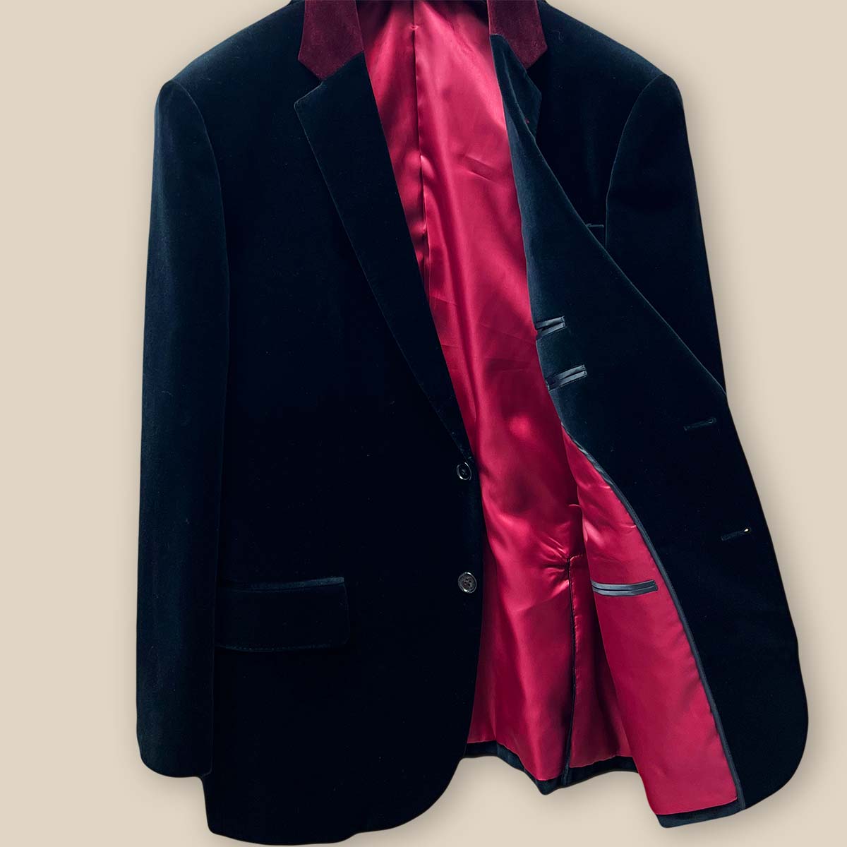 Inside left view displaying the meticulous finish of a black velvet tuxedo suit dinner jacket.