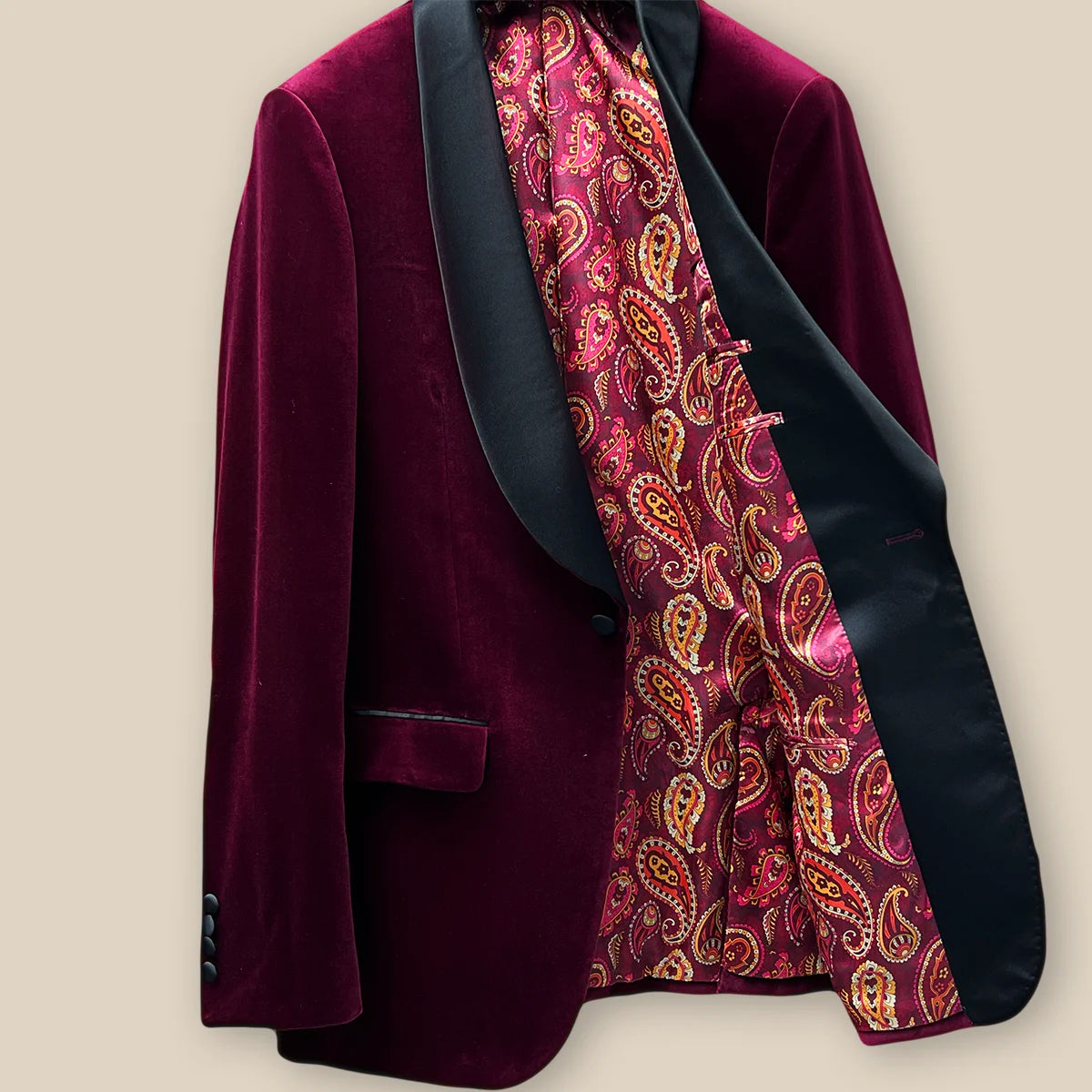 Left interior view of a burgundy velvet tuxedo jacket.