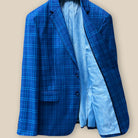 Inside left view revealing the lining quality of a colbalt blue checkered plaid men's sport coat.