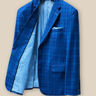 Inside right view showing the internal craftsmanship of a colbalt blue checkered plaid men's sport coat.