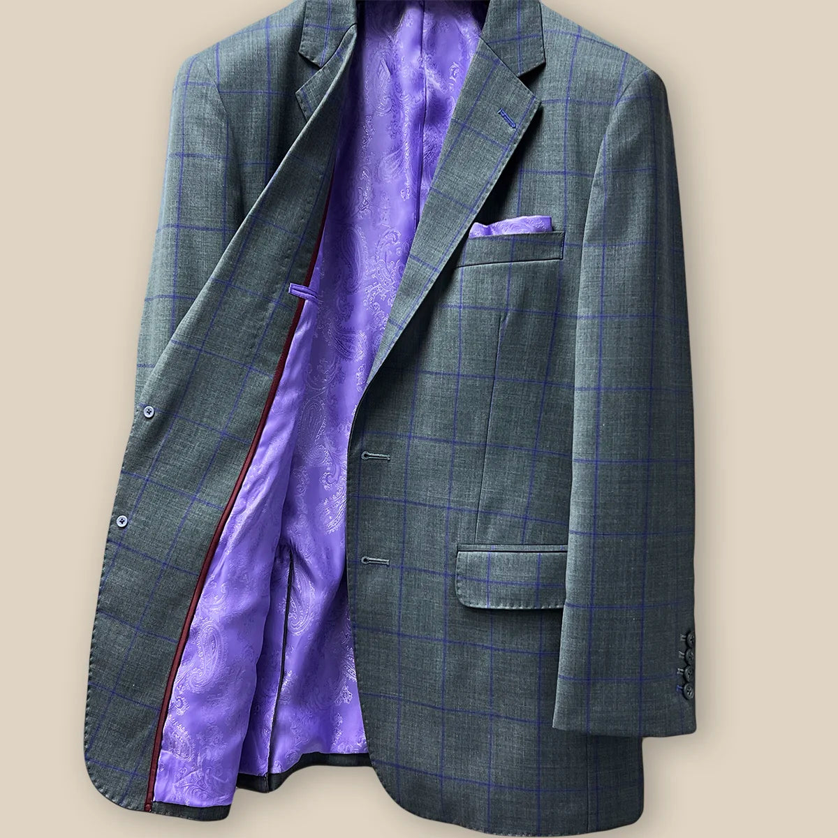 Right inside view of a grey purple windowpane sportcoat.