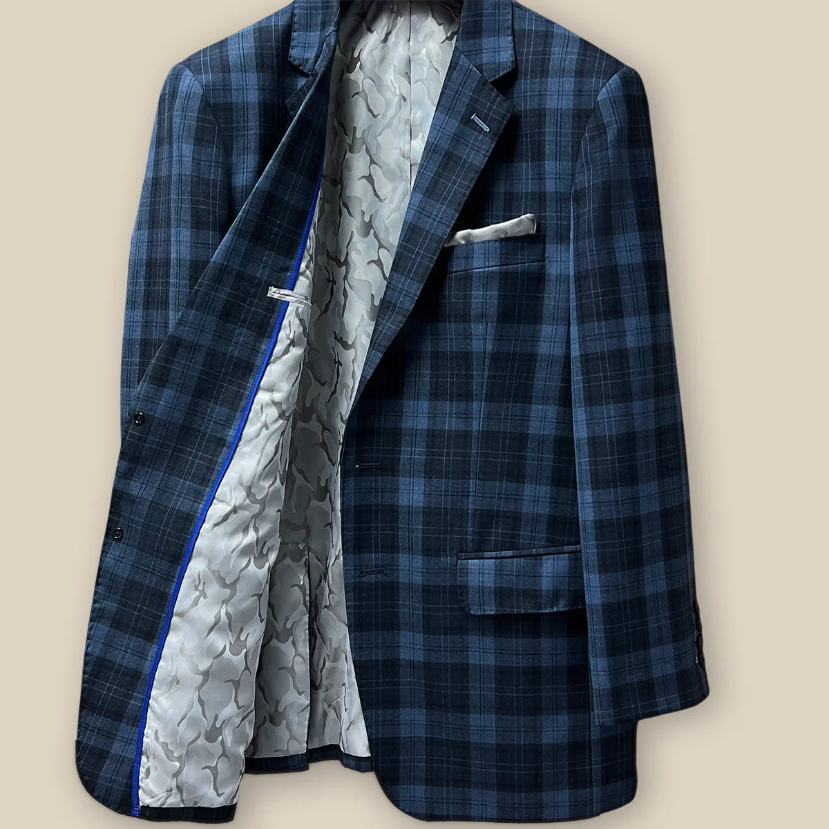 Right view of the inside of a Prussian Blue sportcoat showing the grey flash lining.