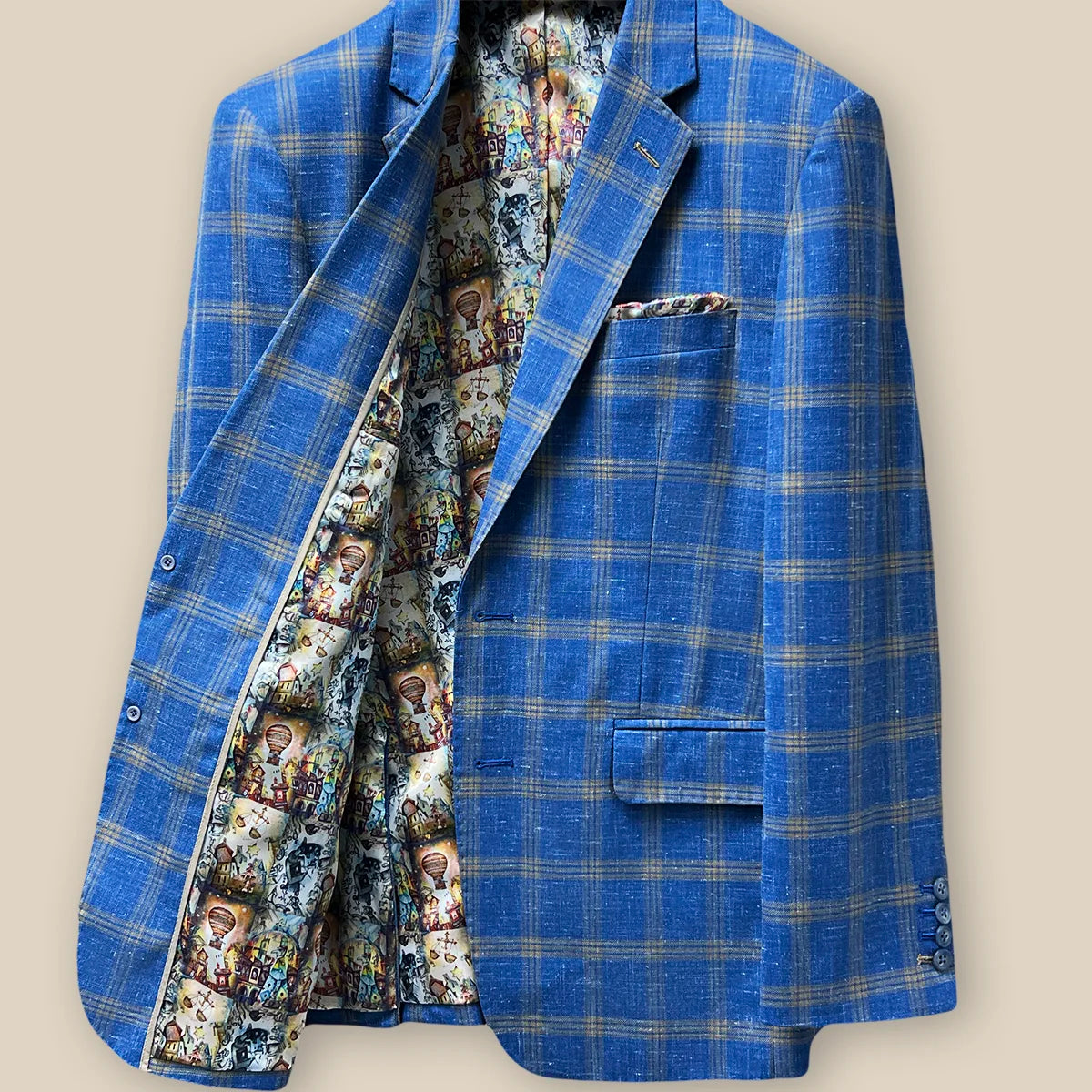 Inside right view showing the inner details of a sky blue with tan windowpane men's sport coat.