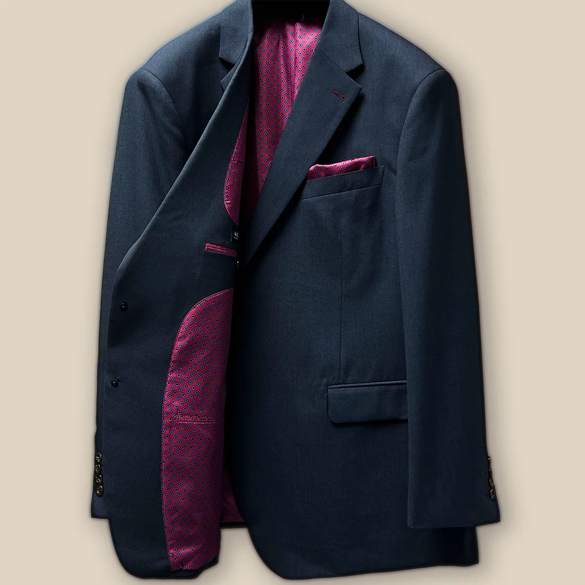 Inside right view of a charcoal grey suit jacket