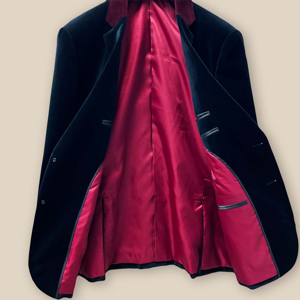 Inside view revealing the exceptional craftsmanship of a black velvet tuxedo suit dinner jacket.