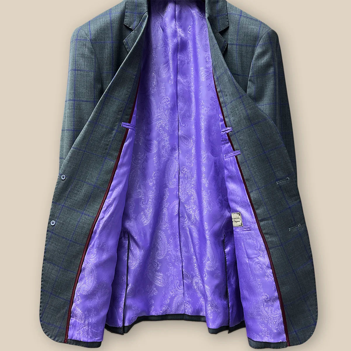 Interior view of a grey purple windowpane sportcoat.
