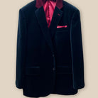 Jacket button panel view demonstrating the elegance of a black velvet tuxedo suit dinner jacket.