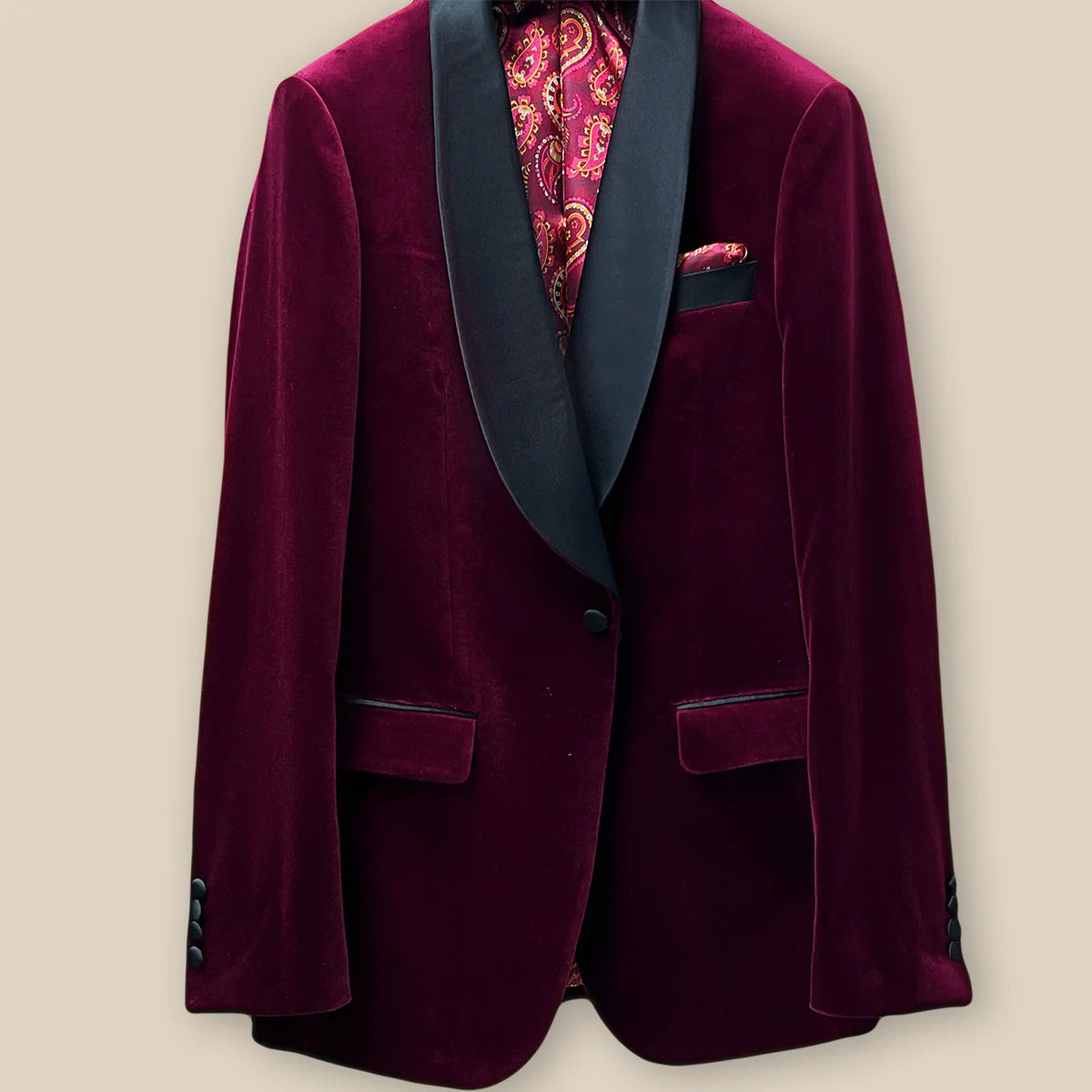 Button panel view on a burgundy velvet formal tuxedo jacket.