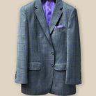 Front button panel of a grey purple windowpane sportcoat.