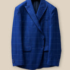 Front button panel of a navy blue windowpane suit jacket