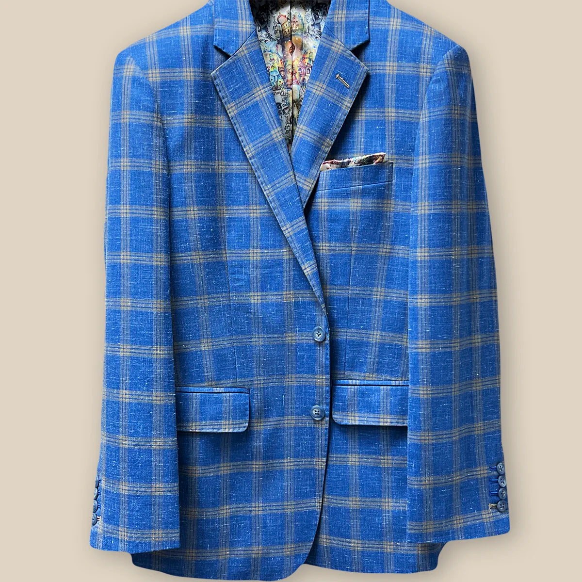 Jacket button panel view displaying the button details on a sky blue with tan windowpane men's sport coat.