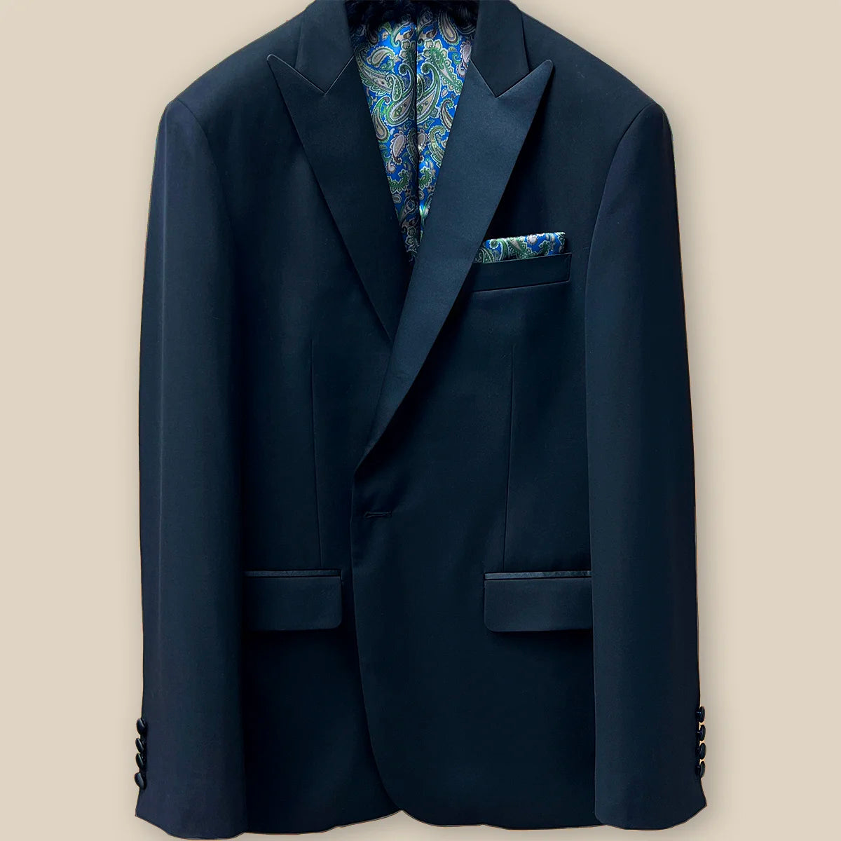 View of the buttonhole panel demonstrating the detailed work on a black tuxedo suit dinner jacket.