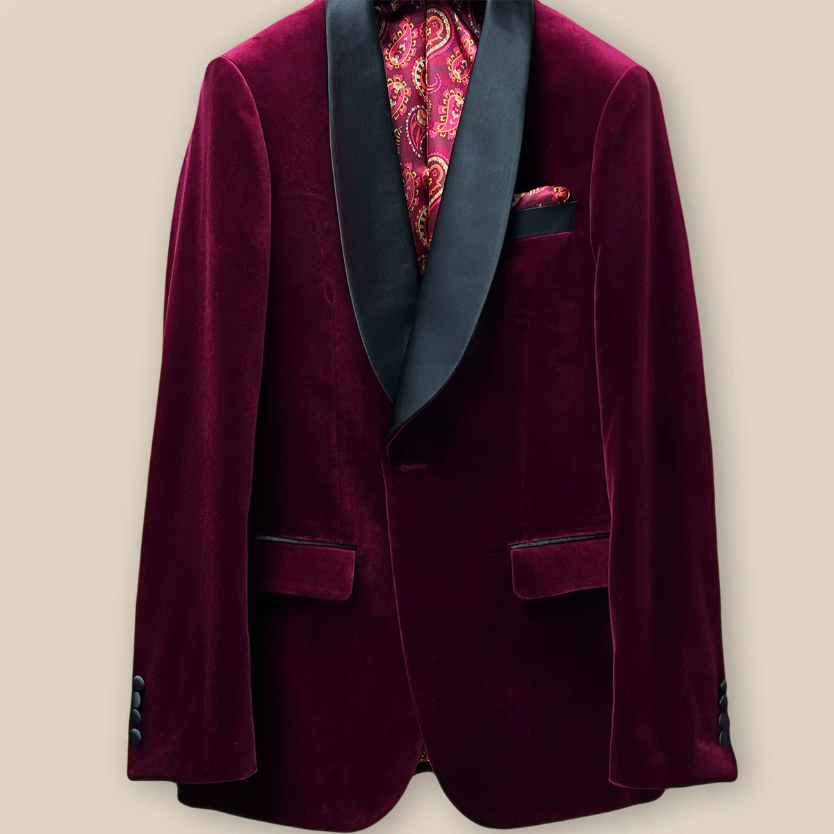Buttonhole panel of a burgundy velvet tuxedo dinner jacket.