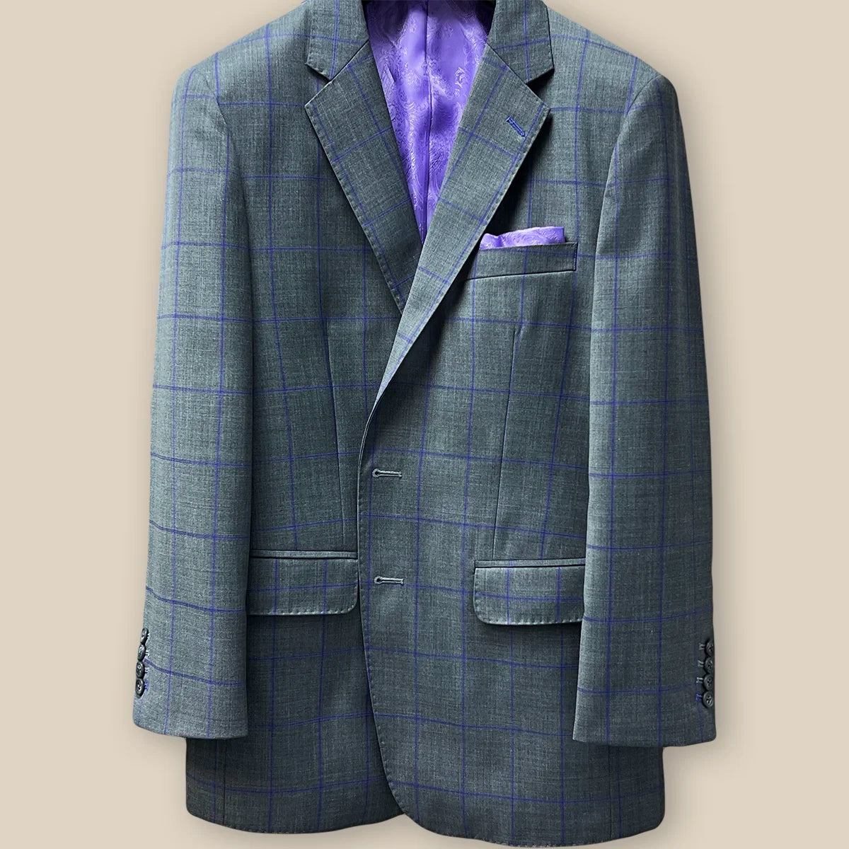 Buttonhole panel of a grey purple windowpane sportcoat.