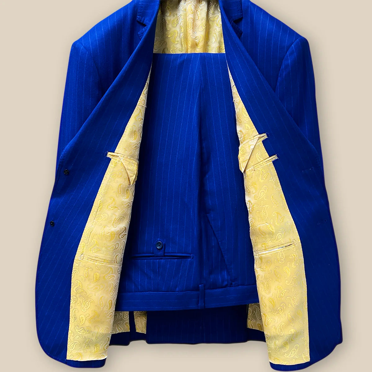 Full view of the royal blue pinstripe suit with jacket and pants.