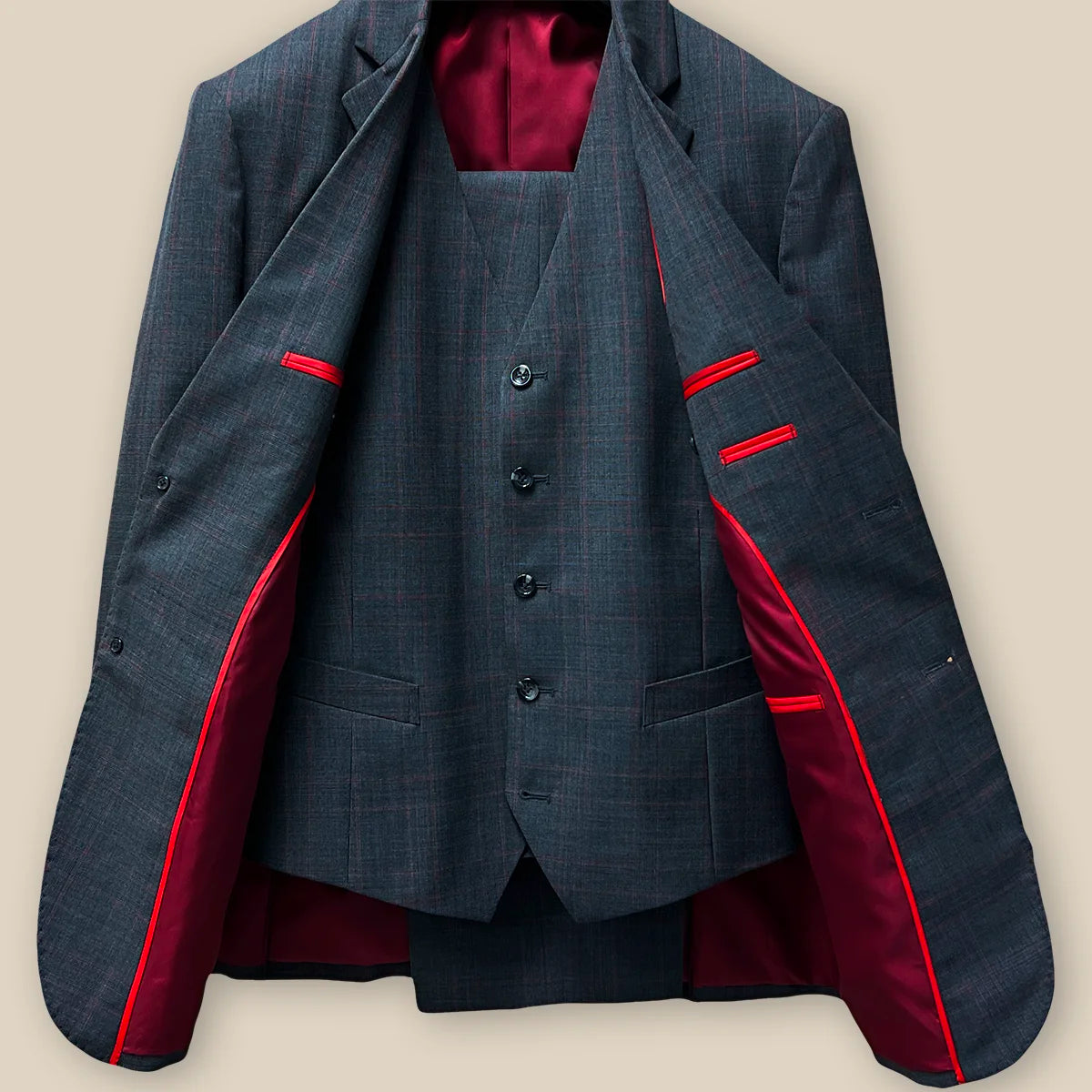 Jacket, pants, and vest 3pc three piece full view revealing a complete ensemble in charcoal grey prince of wales plaid with maroon windowpane.