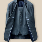 Full view of a three-piece dark grey nailhead suit, including jacket, pants, and vest.