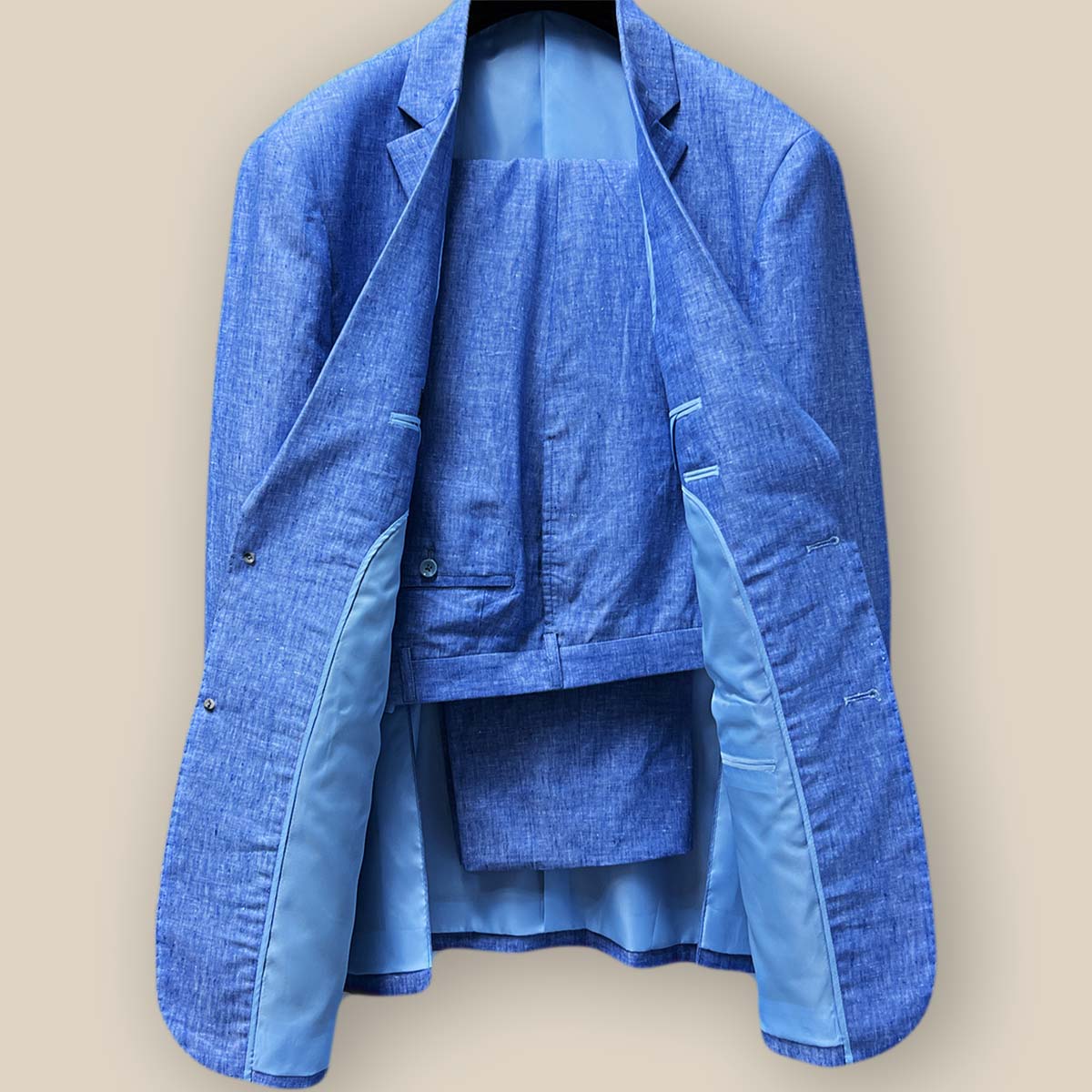 Front view of complete light blue solid Irish linen two-piece men's suit