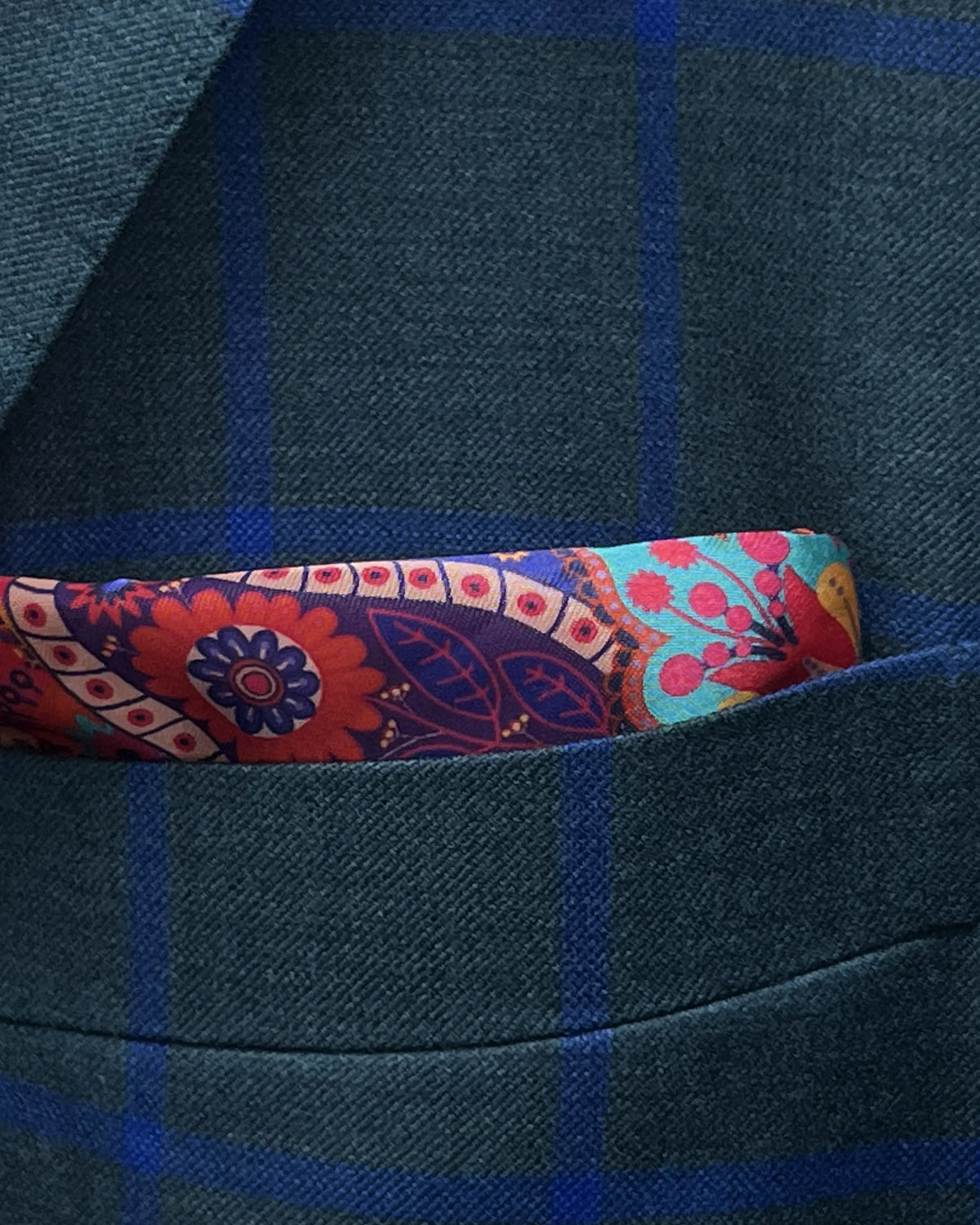 Breast pocket detail of Deep Teal Green Windowpane men's sport coat showing the built in lining pocket square