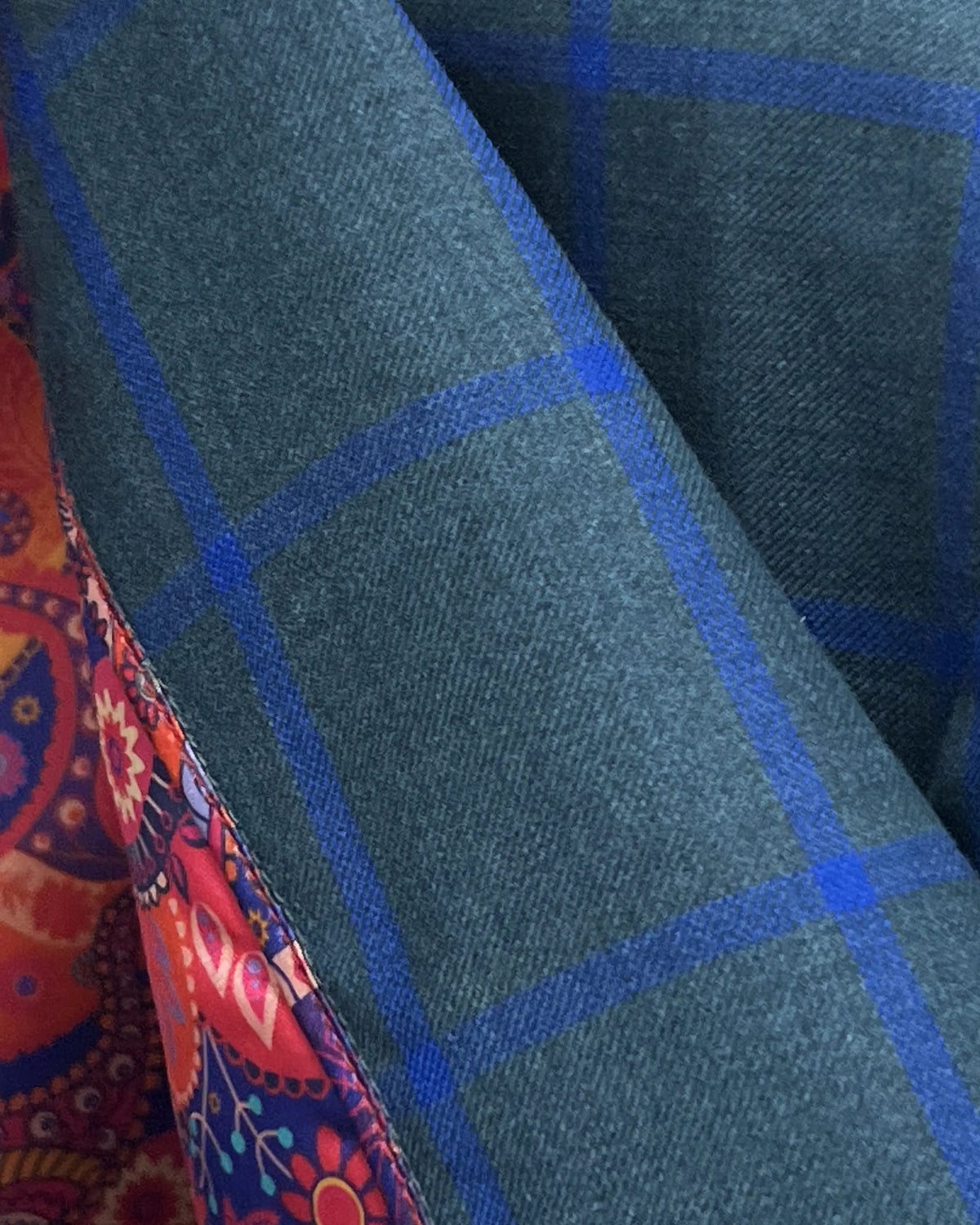 Fabric texture detail of Deep Teal Green Windowpane men's sport coat showing the wool cloth surface and windowpane weave
