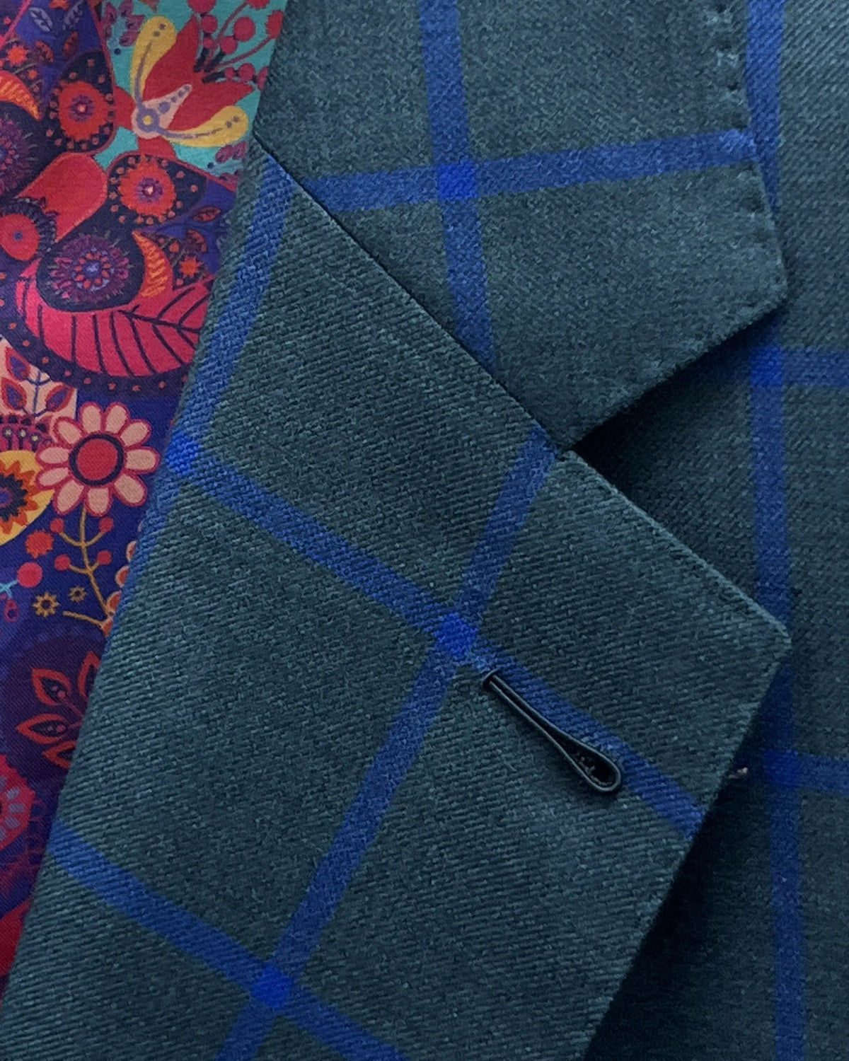 Lapel buttonhole detail of Deep Teal Green Windowpane men's sport coat showing the Milanese lapel buttonhole