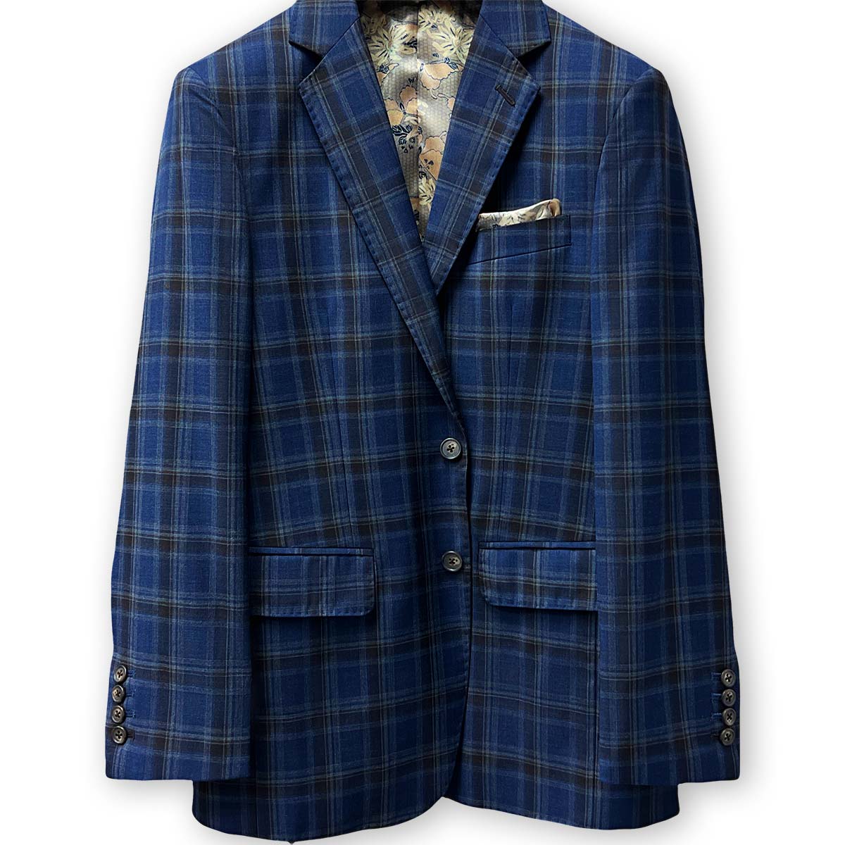 Ideal for grooms, a dark blue and brown plaid 100% Australian Merino wool suit by Westwood Hart.
