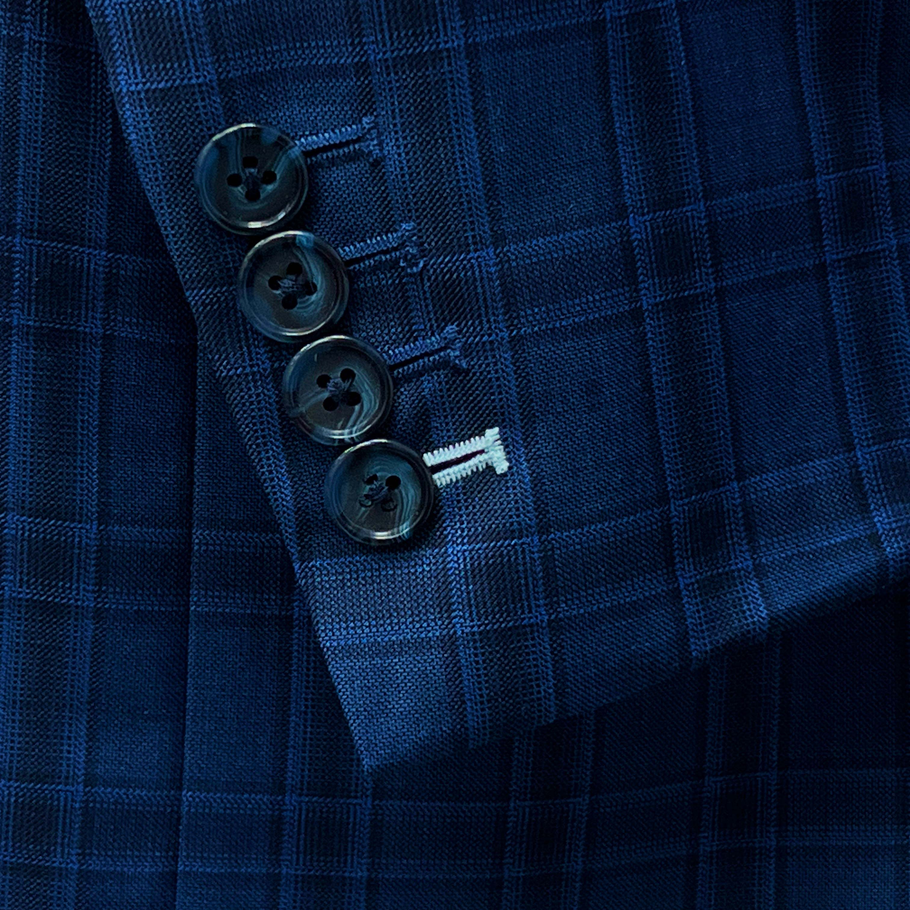 Tailored suit made from 100% Australian Merino Wool for a sophisticated look.