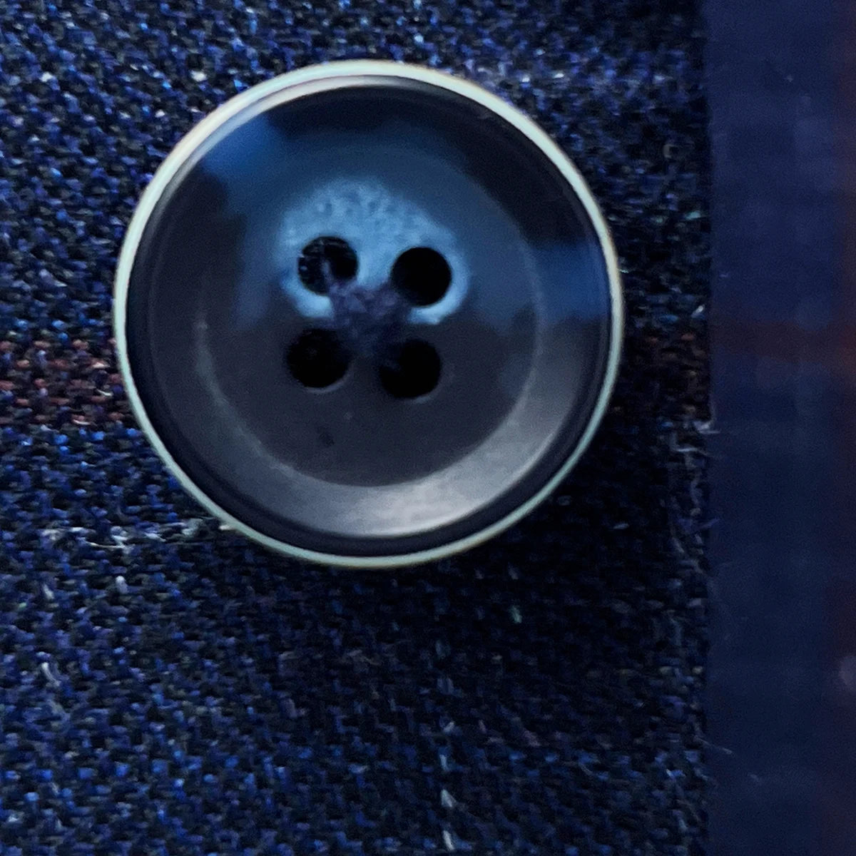 Alternative button option showing horn marble buttons on navy windowpane sport coat for different styling preferences