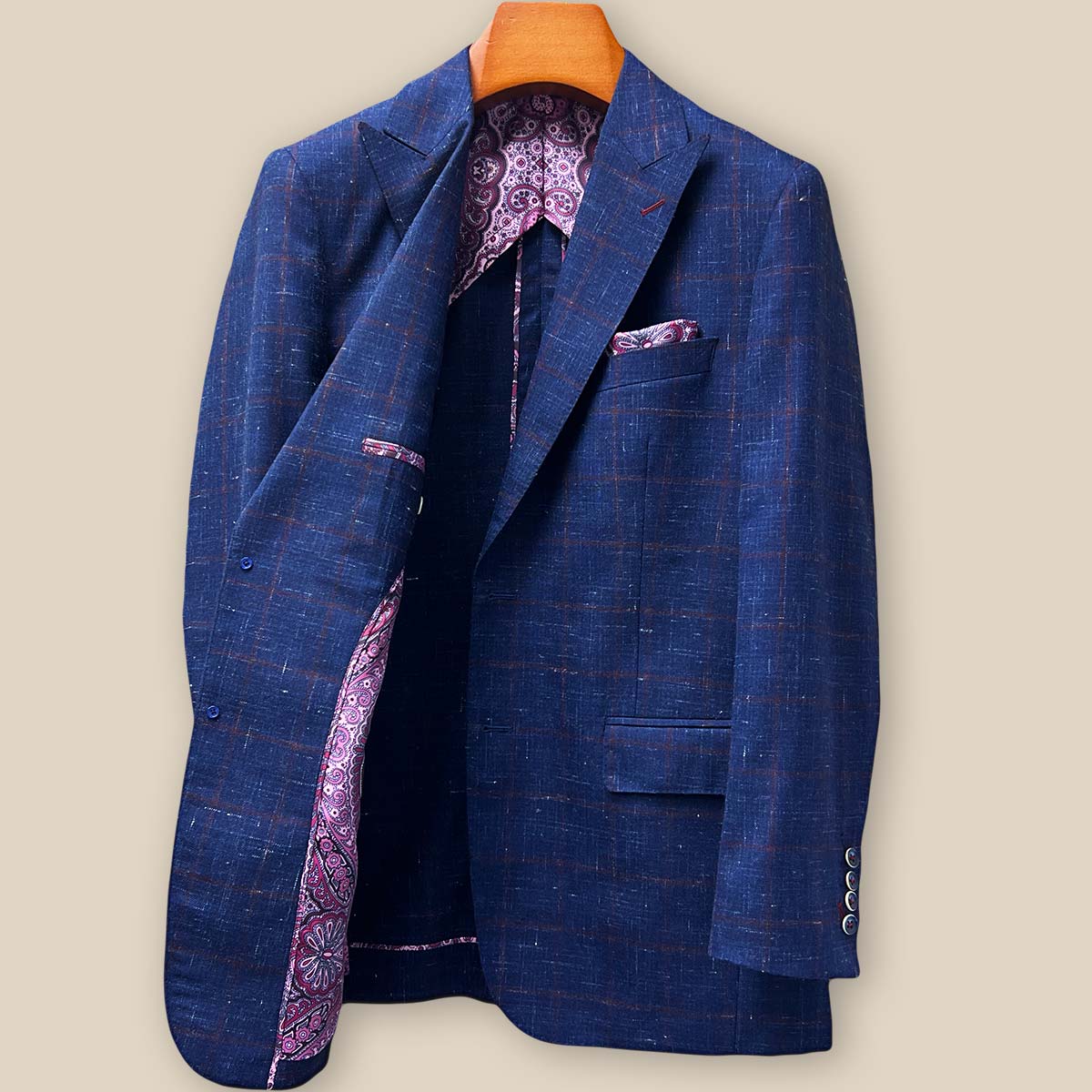 Interior right side view of navy windowpane sport coat revealing half-lining construction, internal pocket configuration, and quality craftsmanship details