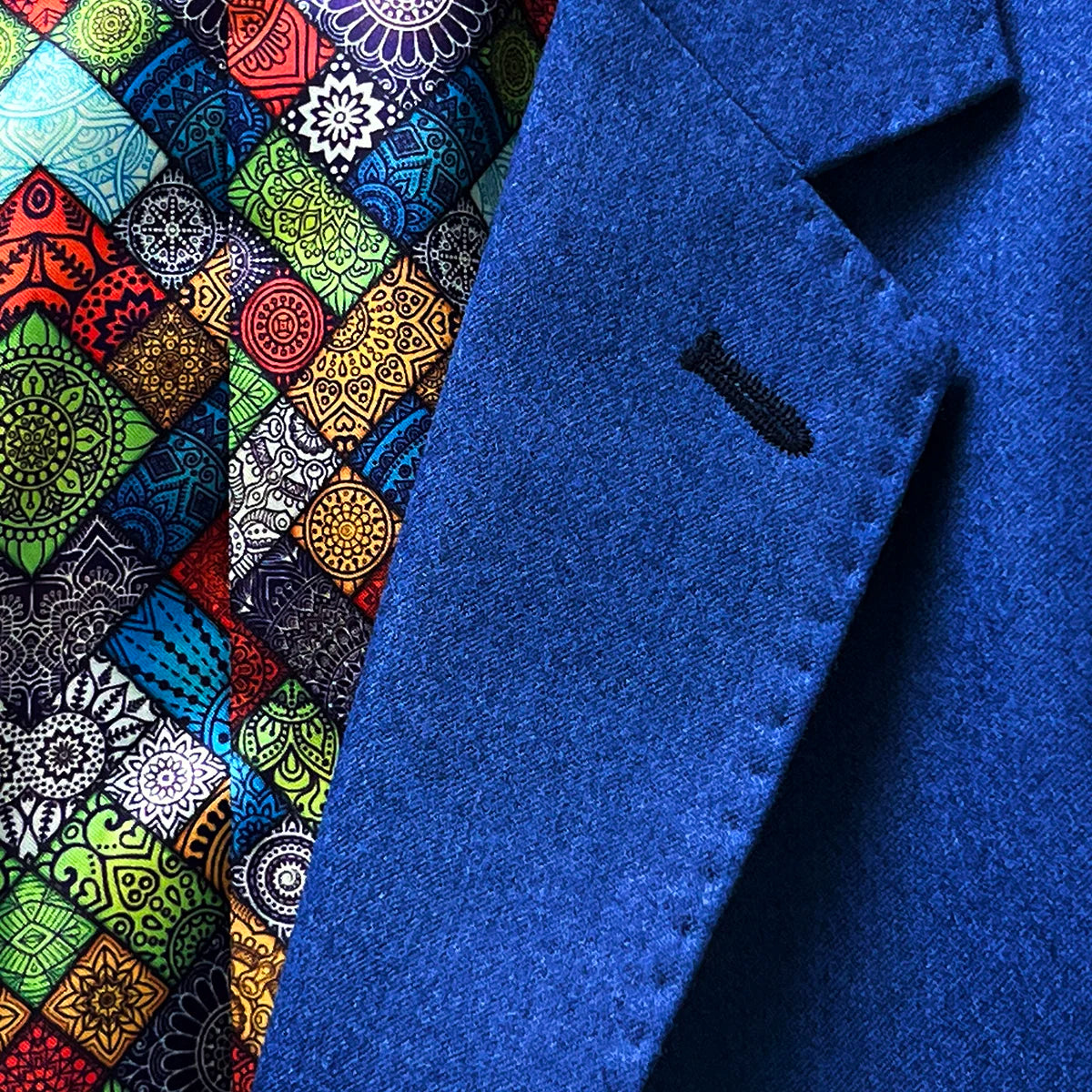 Notch lapel design on a light blue flannel suit for men.